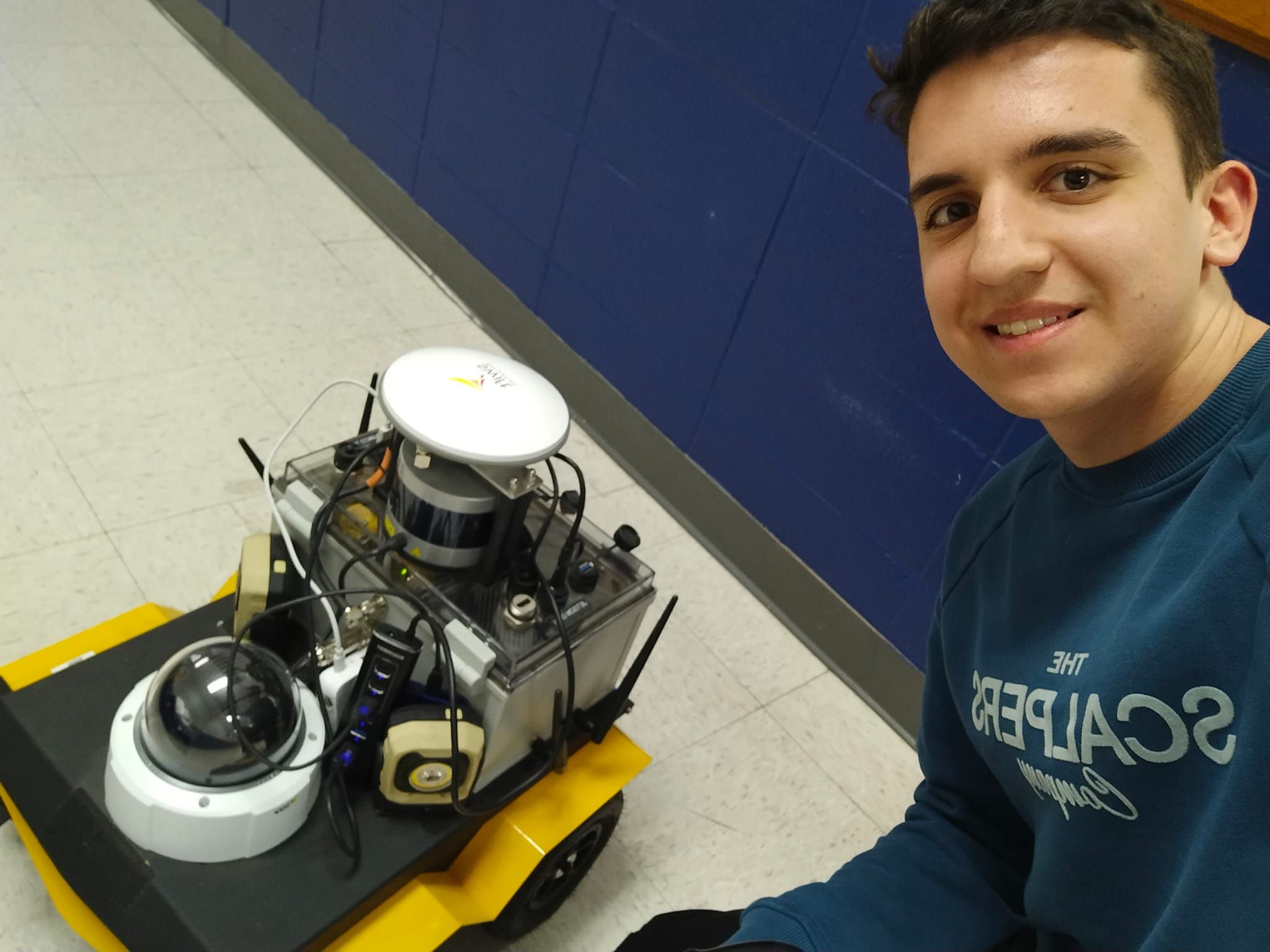 Enrique with GulfSCEI's Jackal land vehicle.