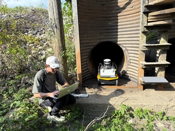 Researcher Johny Lopez uses the Clearpath Jackal to perform a trial pipe inspection.